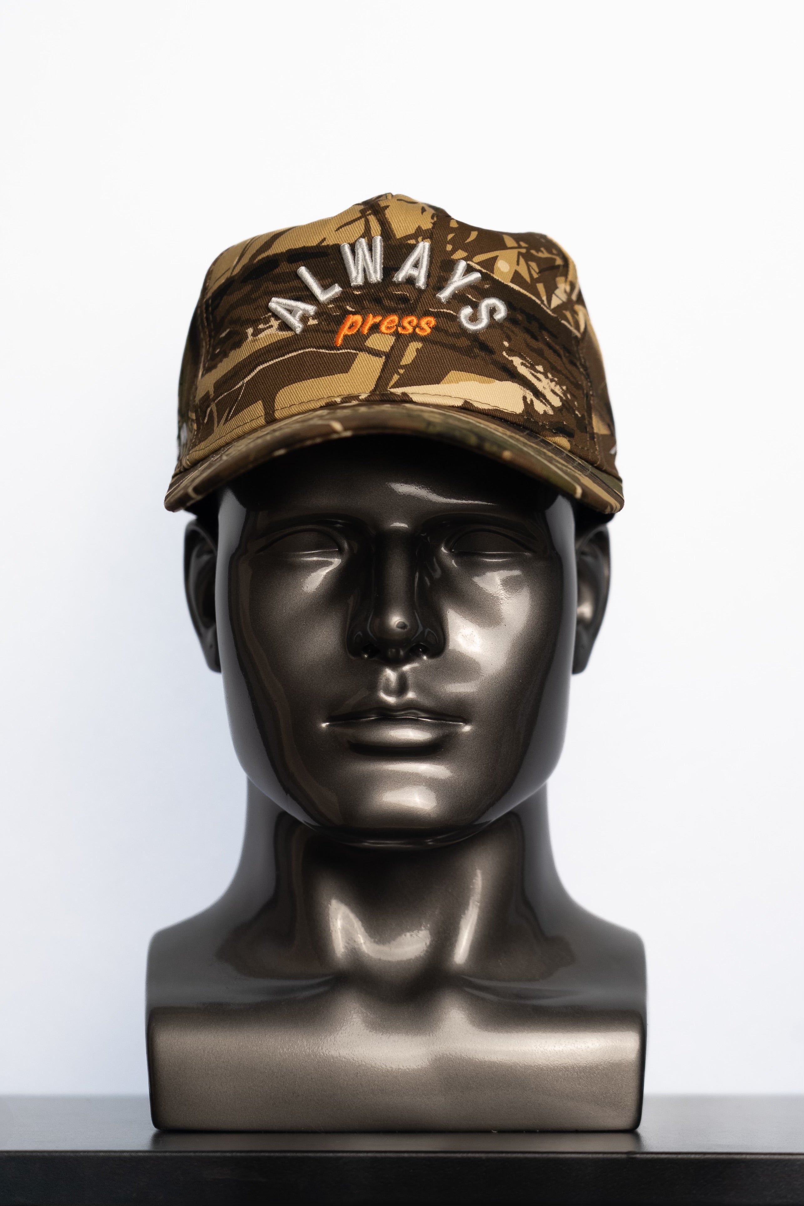 the camo ALWAYS PRESS hat