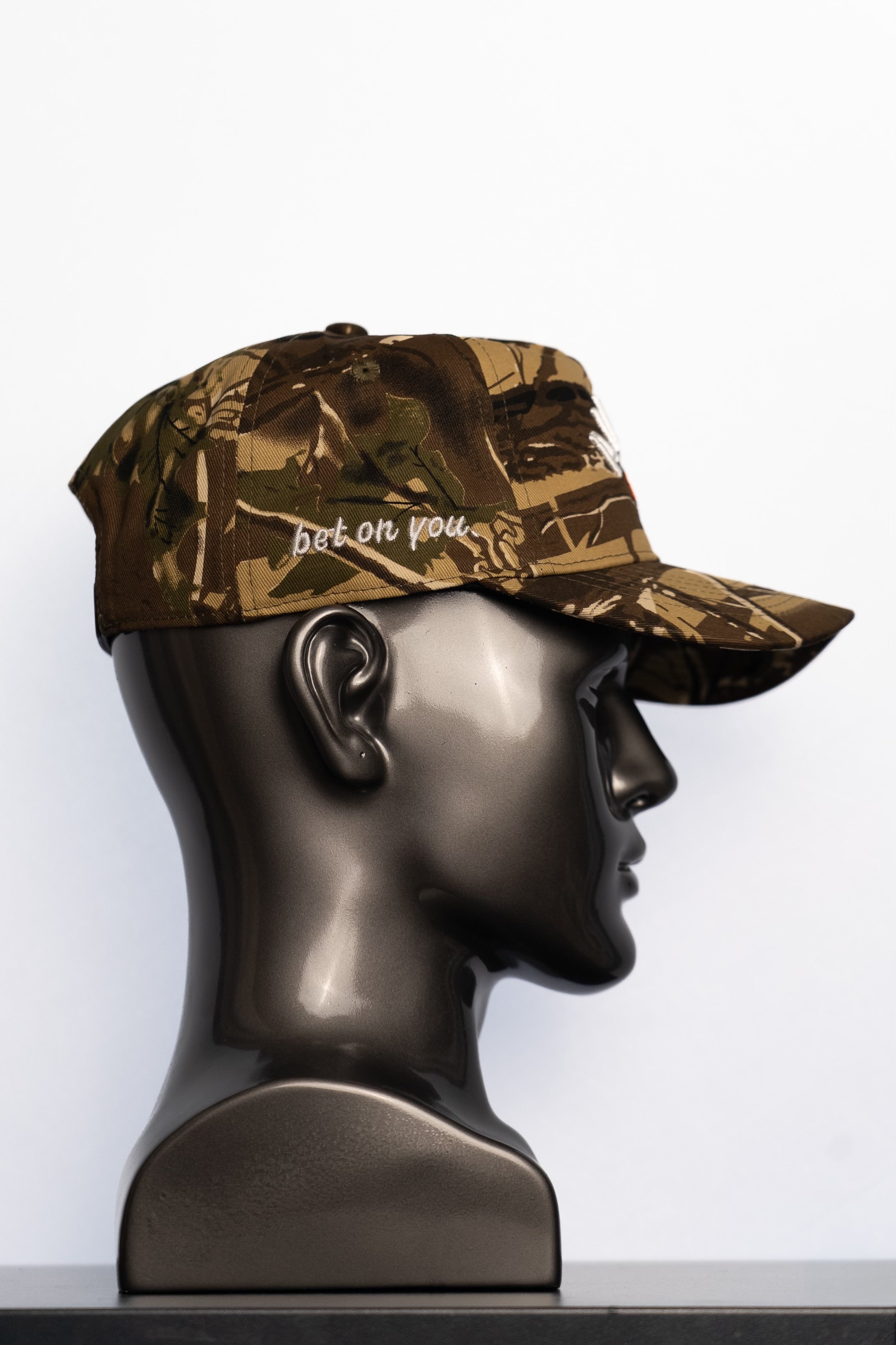 the camo ALWAYS PRESS hat