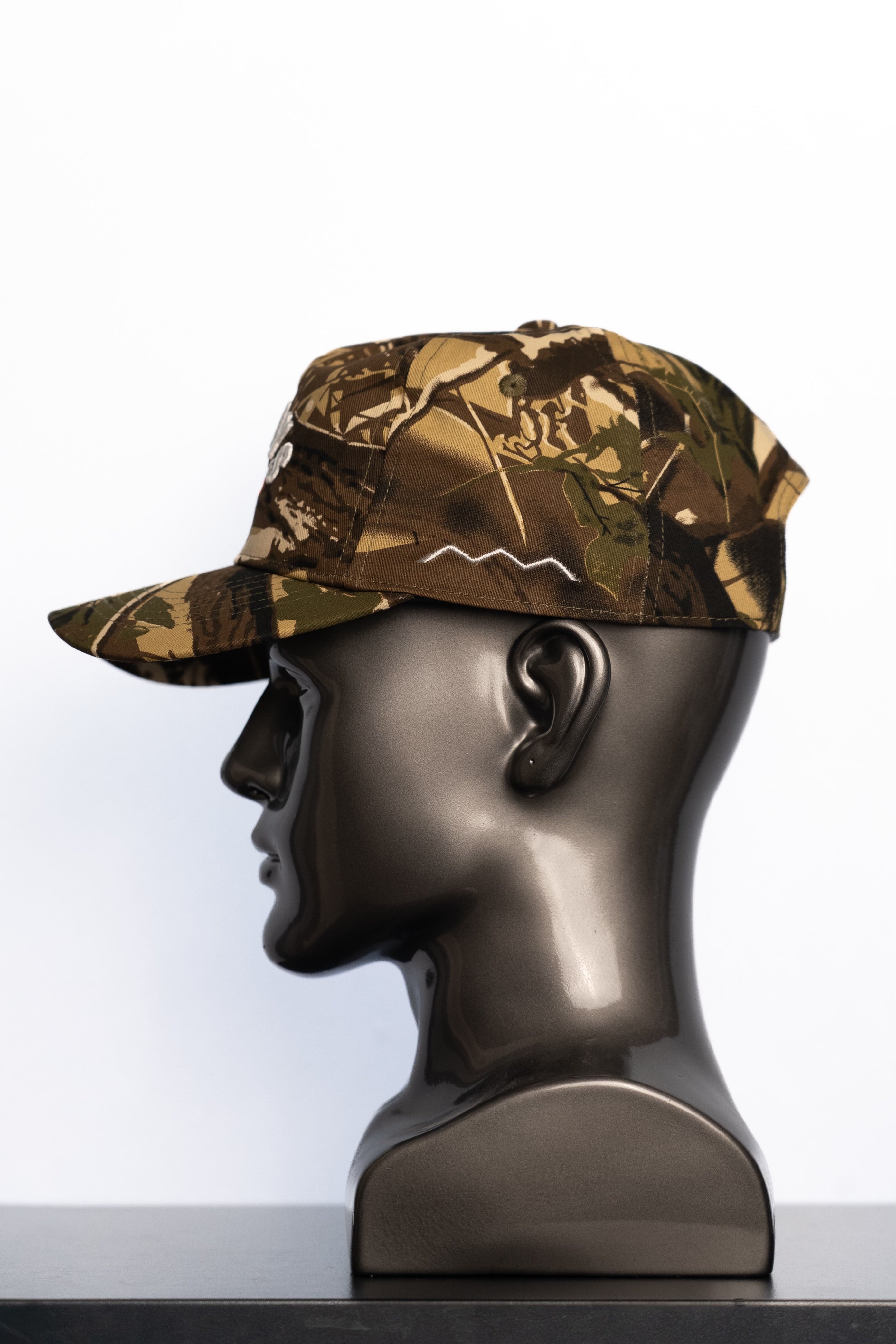 the camo ALWAYS PRESS hat